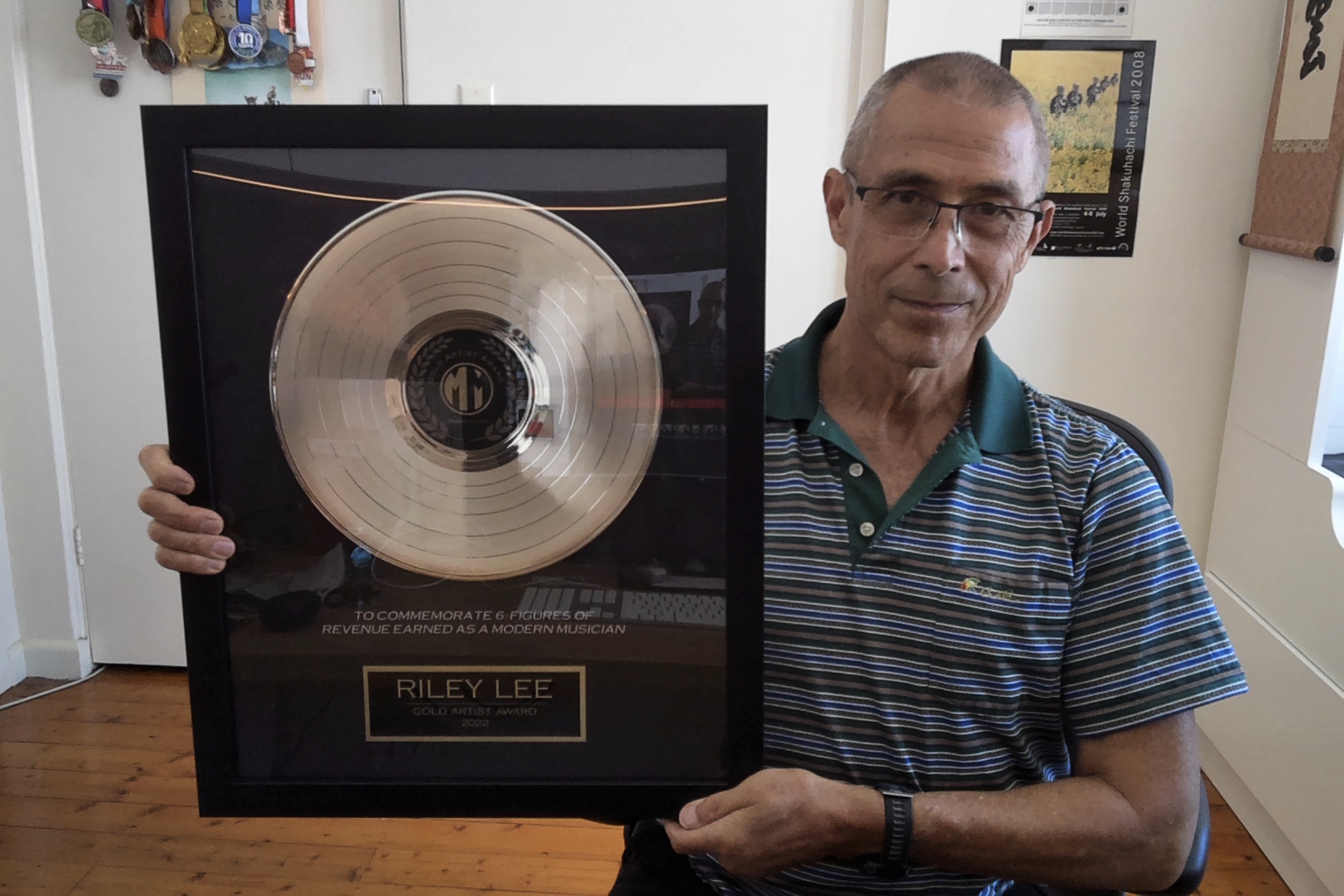 Riley Lee receiving their Modern Musician award